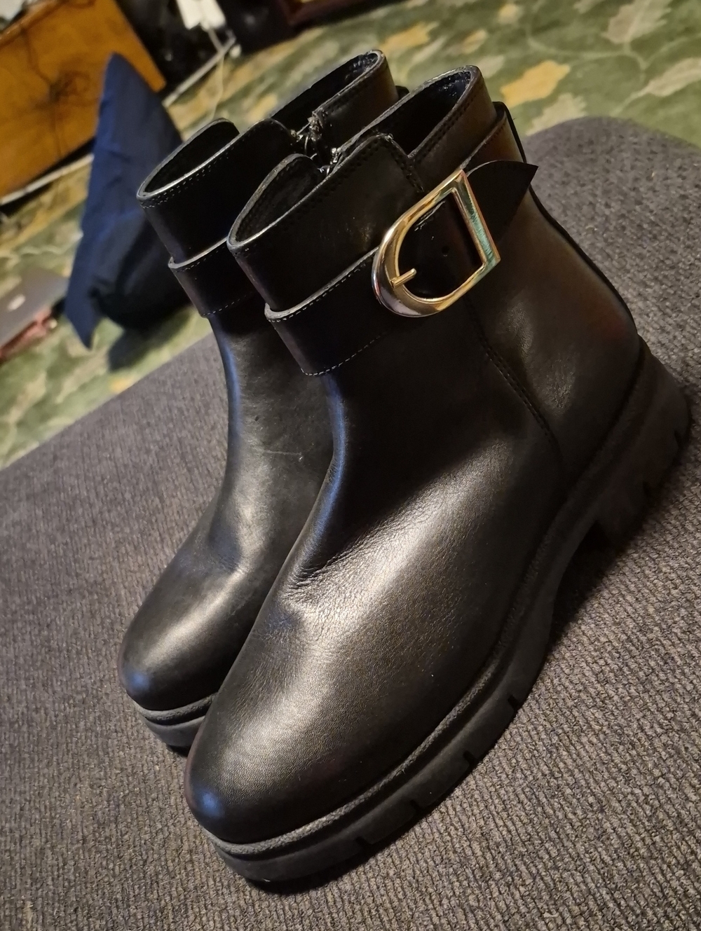 Coach and Four Black Leather Ankle Booties with Gold Buckle Accent